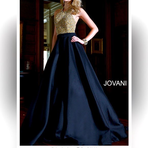 Elegant Jovani style 21667. Color is Nude/ Black. Size 4.